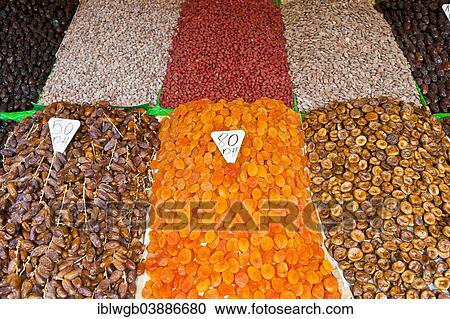 "Dried apricots, dates, figs and nuts, on sale at a market stall in Djemaa el Fna square, Marrakech, Morocco, Africa" View Large Photo Image Stock Image - "Dried apricots, dates, figs and nuts, on sale at a market stall in Djemaa el Fna square, Marrakech, Morocco, Africa". Fotosearch