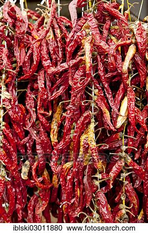 Stock Image - "Dried chilli peppers in the vegetable market in Rovinj, Rovingo, Istria, Croatia, Europe, Rovinj, Croatia, Europe". Fotosearch
