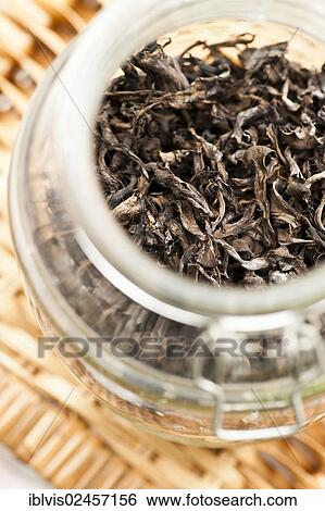 "Dried edible mushrooms, Black chanterelles, in a glass jar" View Large Photo Image Stock Photograph - "Dried edible mushrooms, Black chanterelles, in a glass jar". Fotosearch