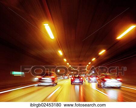 Stock Image - "Driving through a tunnel wet from the rain, Munich, Upper Bavaria, Bavaria, Germany, Europe". Fotosearch