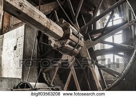 Stock Photo - "Driving wheel for the tower lift in """"Daniel"""", the steeple of St. George's Church, historic center, Nordlingen, Bavaria, Germany, Europe". Fotosearch