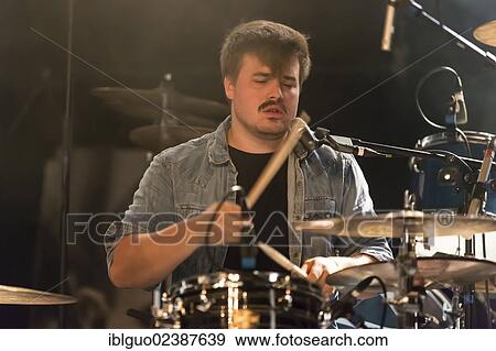 "Drummer Chris Filter from the Swiss band Signori Misteriosi performing live in the Schueuer concert hall, Lucerne, Switzerland, Europe" View Large Photo Image Stock Photo - "Drummer Chris Filter from the Swiss band Signori Misteriosi performing live in the Schueuer concert hall, Lucerne, Switzerland, Europe". Fotosearch