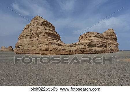"Dry desert landscape with rock formations, historic Silk Road, Yumen Pass, Yadan National Park, Gansu, China, Asia" View Large Photo Image Stock Photography - "Dry desert landscape with rock formations, historic Silk Road, Yumen Pass, Yadan National Park, Gansu, China, Asia". Fotosearch