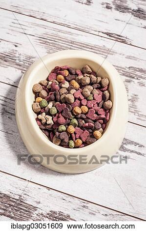 Dry dog food in a bowl View Large Photo Image Stock Photo - Dry dog food in a bowl. Fotosearch