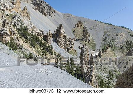 Stock Image - "Dry weathered landscape, """"Casse Deserte"""" along the pass road of Col d'Izoard, 2361 m, Regional Natural Park of Queyras or Parc naturel regional du Queyras, Avrieux, Provence-Alpes-Cote d'Azur, France, Europe". Fotosearch