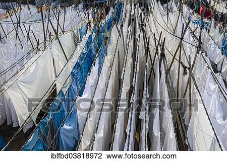 Stock Image - "Drying laundry, Mahalaxmi Dhobi Ghat, laundry district of Mumbai, Maharashtra, India, Asia". Fotosearch