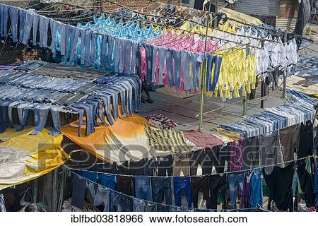 Stock Photograph - "Drying laundry, Mahalaxmi Dhobi Ghat, laundry district of Mumbai, Maharashtra, India, Asia". Fotosearch