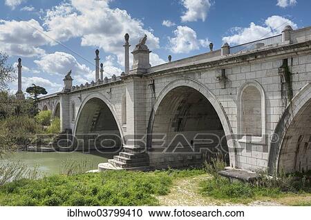 Stock Image - "Duca d'Aosta bridge over the Tiber River, 1939 to 1942, access to the Foro Italico, formerly Foro Mussolini, symbols of the fascist ideology displayed on the bridge, Rome, Lazio, Italy, Europe". Fotosearch
