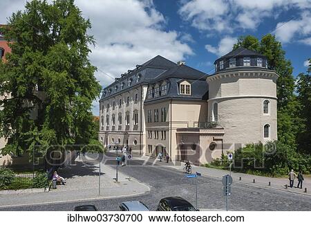 Stock Image - "Duchess Anna Amalia Library with the books tower, left the Goethe Ginkgo tree, Weimar, Thuringia, Germany, Europe". Fotosearch