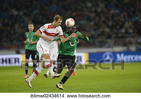 Picture - "Duel between Georg Niedermeier, VfB Stuttgart, left, and Mame Diouf, Hannover 96, Mercedes-Benz Arena, Stuttgart, Baden-Wuerttemberg, Germany, Europe". Fotosearch