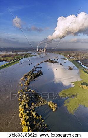 "Duisburg-Walsum, Rhine River, STEAG Voerde Power Plant in the distance, flood, aerial view, Rheinberg, North Rhine-Westphalia, Germany, Europe" View Large Photo Image Stock Photography - "Duisburg-Walsum, Rhine River, STEAG Voerde Power Plant in the distance, flood, aerial view, Rheinberg, North Rhine-Westphalia, Germany, Europe". Fotosearch