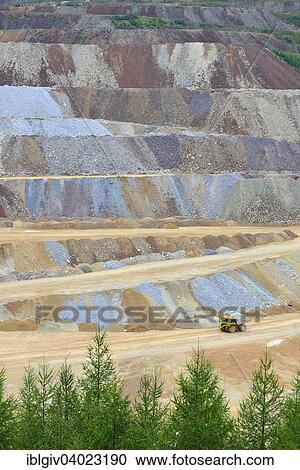 "Dump Truck in ore mining, surface mining, Erzberg mountain at Eisenerz, Styria, Austria, Europe" View Large Photo Image Stock Image - "Dump Truck in ore mining, surface mining, Erzberg mountain at Eisenerz, Styria, Austria, Europe". Fotosearch