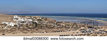 "Dune landscape near Los Gorriones and the lagoon at back, Risco del Paso, Fuerteventura, Canary Islands, Spain, Europe" View Large Photo Image Stock Image - "Dune landscape near Los Gorriones and the lagoon at back, Risco del Paso, Fuerteventura, Canary Islands, Spain, Europe". Fotosearch