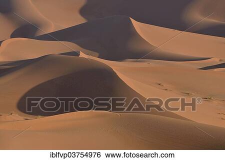 Stock Photograph - "Dunes in the morning light, Great Sand Sea, Sahara, Merzouga, Meknes-Tafilalet region, Morocco, Africa". Fotosearch