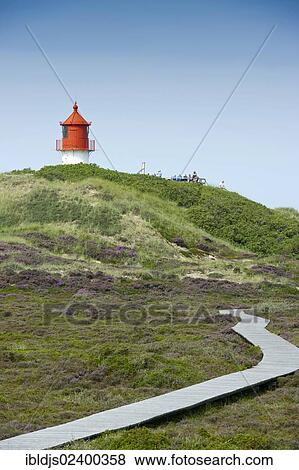 "Dunes with cross light and boardwalk, Norddorf, Amrum, North Frisian Islands, Schleswig-Holstein, Germany, Europe" View Large Photo Image Stock Photo - "Dunes with cross light and boardwalk, Norddorf, Amrum, North Frisian Islands, Schleswig-Holstein, Germany, Europe". Fotosearch