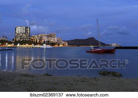 "Dusk with views of Diamond Head, Waikiki Beach, Honolulu, O'ahu, Hawaii, USA" View Large Photo Image Stock Photo - "Dusk with views of Diamond Head, Waikiki Beach, Honolulu, O'ahu, Hawaii, USA". Fotosearch
