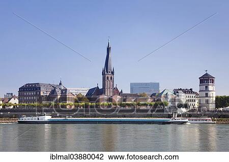 "Dusseldorf's historic town centre with St. Lambertus Church and Schlossturm tower on the Rhine promenade, Dusseldorf, North Rhine-Westphalia, Germany, Europe" View Large Photo Image Stock Image - "Dusseldorf's historic town centre with St. Lambertus Church and Schlossturm tower on the Rhine promenade, Dusseldorf, North Rhine-Westphalia, Germany, Europe". Fotosearch