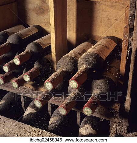 "Dusty bottles of Bordeaux wine in a cellar, France, Europe" View Large Photo Image Stock Photograph - "Dusty bottles of Bordeaux wine in a cellar, France, Europe". Fotosearch