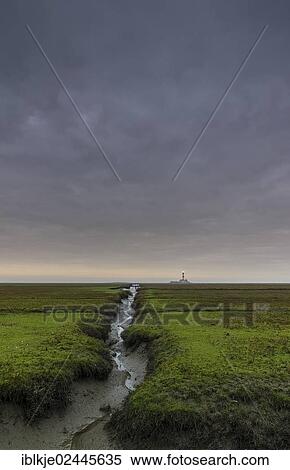 "Dwelling mound, jetty, Westerheversand, the lighthouse at the back, Eiderstedt, Northern Friesland, Schleswig-Holstein, Germany, Europe" View Large Photo Image Stock Photography - "Dwelling mound, jetty, Westerheversand, the lighthouse at the back, Eiderstedt, Northern Friesland, Schleswig-Holstein, Germany, Europe". Fotosearch