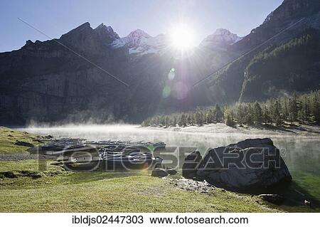 "Early morning at Oeschinensee, Oeschinen Lake, Bernese Oberland, Canton of Bern, Switzerland, Europe" View Large Photo Image Stock Image - "Early morning at Oeschinensee, Oeschinen Lake, Bernese Oberland, Canton of Bern, Switzerland, Europe". Fotosearch