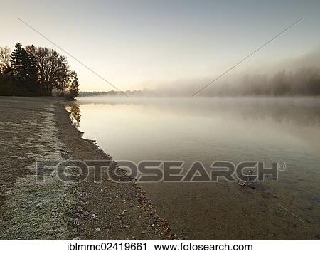 Early morning mood at Kuhsee lake with fog, Augsburg, Swabia, Bavaria, Germany, Europe View Large Photo Image Stock Image - Early morning mood at Kuhsee lake with fog, Augsburg, Swabia, Bavaria, Germany, Europe. Fotosearch