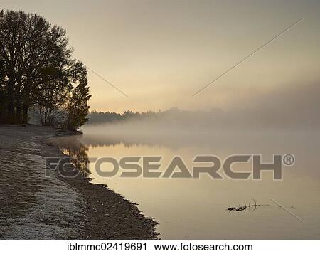 Early morning mood at Kuhsee lake with fog, Augsburg, Swabia, Bavaria, Germany, Europe View Large Photo Image Stock Image - Early morning mood at Kuhsee lake with fog, Augsburg, Swabia, Bavaria, Germany, Europe. Fotosearch