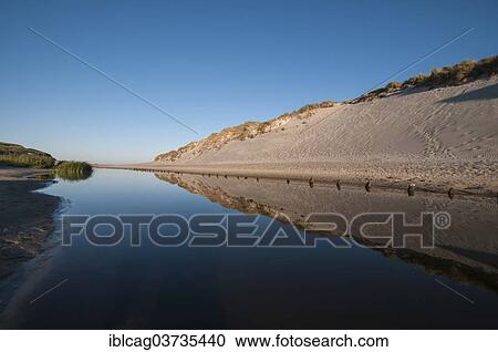 Stock Image - "Early morning mood at the river of Henne Molle A, Henne Strand, Jutland, Denmark, Europe". Fotosearch