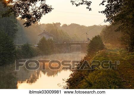 "Early morning on the Canal des Vosges, formerly Canal de l'Est, at lock No. 41, Selles, Vesoul, Haute-Saone, Franche-Comte, France, Europe" View Large Photo Image Stock Image - "Early morning on the Canal des Vosges, formerly Canal de l'Est, at lock No. 41, Selles, Vesoul, Haute-Saone, Franche-Comte, France, Europe". Fotosearch