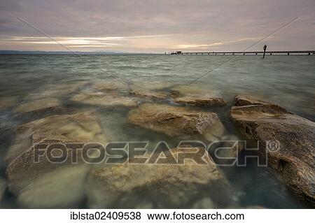 Stock Photo - "Early morning on the shores of Lake Constance near Altnau, Switzerland, Europe". Fotosearch