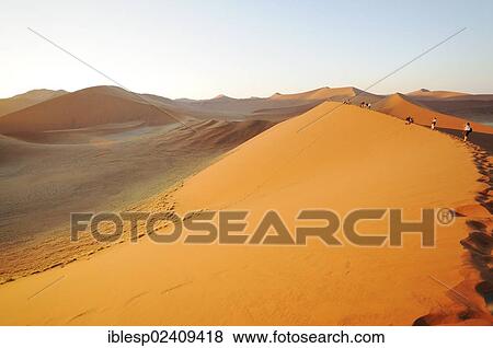 "Early morning view from Dune 45 on a desert landscape with dunes, Tsauchab-Tal, Sossusvlei, Namib-Naukluft-Park, Namib-Wuste, Namibia, Africa" View Large Photo Image Stock Photo - "Early morning view from Dune 45 on a desert landscape with dunes, Tsauchab-Tal, Sossusvlei, Namib-Naukluft-Park, Namib-Wuste, Namibia, Africa". Fotosearch