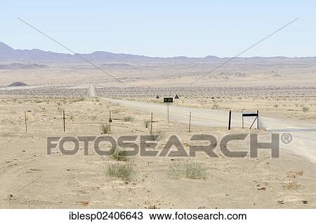 Stock Image - "Earth road in the Karas region, near Klipheuwel, Namibia, Africa". Fotosearch