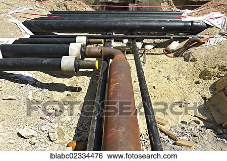 Stock Photograph - "Earthworks, exposed pipes, Munich, Bavaria, Germany, Europe". Fotosearch