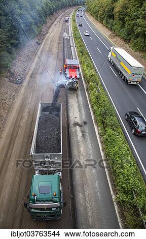 "Earthworks on a large highway construction site on the A52 motorway, near Essen, North Rhine-Westphalia, Germany, Europe" View Large Photo Image Picture - "Earthworks on a large highway construction site on the A52 motorway, near Essen, North Rhine-Westphalia, Germany, Europe". Fotosearch