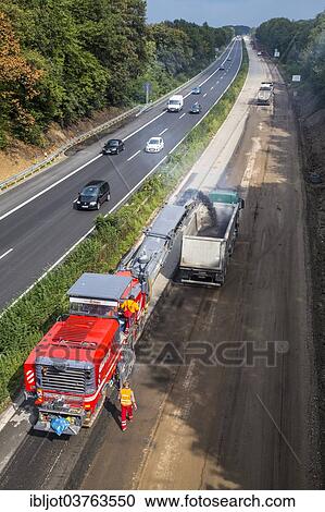 "Earthworks on a large highway construction site on the A52 motorway, near Essen, North Rhine-Westphalia, Germany, Europe" View Large Photo Image Stock Image - "Earthworks on a large highway construction site on the A52 motorway, near Essen, North Rhine-Westphalia, Germany, Europe". Fotosearch