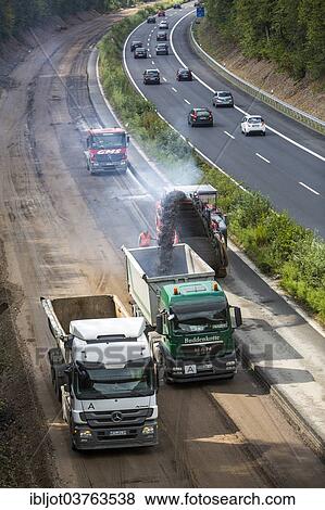 "Earthworks on a large highway construction site on the A52 motorway, near Essen, North Rhine-Westphalia, Germany, Europe" View Large Photo Image Stock Photo - "Earthworks on a large highway construction site on the A52 motorway, near Essen, North Rhine-Westphalia, Germany, Europe". Fotosearch