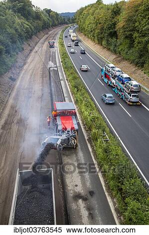 "Earthworks on a large highway construction site on the A52 motorway, near Essen, North Rhine-Westphalia, Germany, Europe" View Large Photo Image Stock Photography - "Earthworks on a large highway construction site on the A52 motorway, near Essen, North Rhine-Westphalia, Germany, Europe". Fotosearch