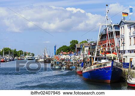"East bank of the Alte Strom River in Warnemuende, Mecklenburg-Western Pomerania, Germany, Europe" View Large Photo Image Stock Photography - "East bank of the Alte Strom River in Warnemuende, Mecklenburg-Western Pomerania, Germany, Europe". Fotosearch