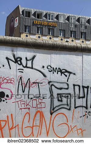 Stock Image - "East Side Hotel behind the East Side Gallery, former Berlin Wall, Muehlenstrasse, Berlin, Germany, Europe". Fotosearch