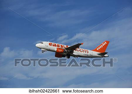 EasyJet A319 aircraft climbing from Duesseldorf International Airport, North Rhine-Westphalia, Germany, Europe View Large Photo Image Stock Image - EasyJet A319 aircraft climbing from Duesseldorf International Airport, North Rhine-Westphalia, Germany, Europe. Fotosearch