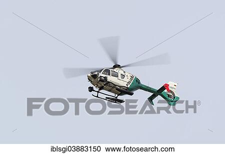 "EC135 police Eurocopter in the air at Munich Airport, Munich, Upper Bavaria, Bavaria, Germany, Europe" View Large Photo Image Stock Image - "EC135 police Eurocopter in the air at Munich Airport, Munich, Upper Bavaria, Bavaria, Germany, Europe". Fotosearch