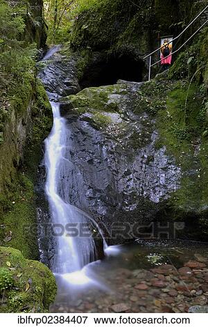 Stock Photo - "Edelfrauengrab waterfalls in Gottschlaegtal valley near Ottenhoefen, near the Karlsruhe ridge in the northern Black Forest, Baden-Wuerttemberg, Germany, Europe". Fotosearch