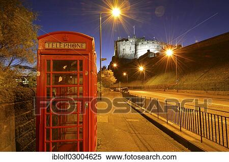 "Edinburgh Castle, illuminated at night, old red British phone booth at front, Edinburgh, Scotland, United Kingdom, Europe" View Large Photo Image Stock Photography - "Edinburgh Castle, illuminated at night, old red British phone booth at front, Edinburgh, Scotland, United Kingdom, Europe". Fotosearch