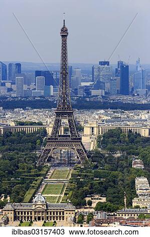 Stock Image - "Eiffel Tower, in front of La Defense, seen from Tour Montparnasse tower, Paris, Ile-de-France, France, Europe". Fotosearch