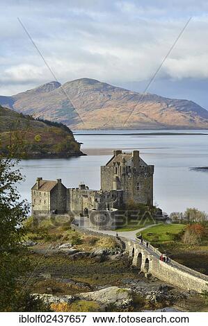 "Eilean Donan Castle with autumnal forest, headquarters of the Scottish clan of Macrae, Loch Duich, Dornie, North West Highlands, Scotland, United Kingdom, Europe" View Large Photo Image Stock Photo - "Eilean Donan Castle with autumnal forest, headquarters of the Scottish clan of Macrae, Loch Duich, Dornie, North West Highlands, Scotland, United Kingdom, Europe". Fotosearch