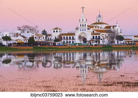 "El Rocio village and Ermita del Rocio hermitage at sunset, El Rocio, Huelva province, Andalusia, Spain, Europe" View Large Photo Image Stock Image - "El Rocio village and Ermita del Rocio hermitage at sunset, El Rocio, Huelva province, Andalusia, Spain, Europe". Fotosearch