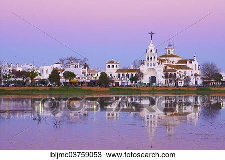 "El Rocio village and Ermita del Rocio hermitage at sunset, El Rocio, Huelva province, Andalusia, Spain, Europe" View Large Photo Image Stock Image - "El Rocio village and Ermita del Rocio hermitage at sunset, El Rocio, Huelva province, Andalusia, Spain, Europe". Fotosearch