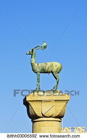"Elafos, sculpture of a deer on a column at the harbour entrance of Rhodes, Mandraki harbour, Rhodes, Rhodos Island, Dodecanese, Greece, Europe" View Large Photo Image Stock Image - "Elafos, sculpture of a deer on a column at the harbour entrance of Rhodes, Mandraki harbour, Rhodes, Rhodos Island, Dodecanese, Greece, Europe". Fotosearch