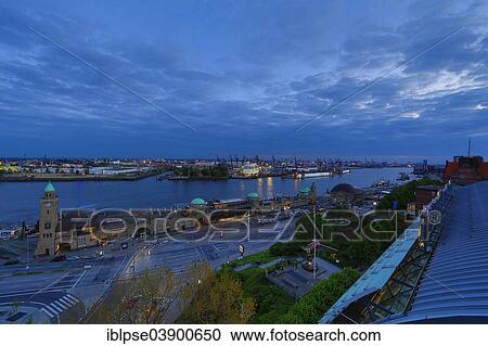 "Elbe River with the St Pauli Landing Stages and the Blohm and Voss shipyard at dusk, Hamburg, Germany, Europe" View Large Photo Image Stock Image - "Elbe River with the St Pauli Landing Stages and the Blohm and Voss shipyard at dusk, Hamburg, Germany, Europe". Fotosearch