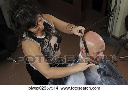 Picture - "Elderly man at a hairdresser's, hair cutting, Baden-Wuerttemberg, Germany, Europe". Fotosearch
