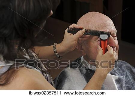 "Elderly man at a hairdresser's, eyebrows cutting, Baden-Wuerttemberg, Germany, Europe" View Large Photo Image Stock Image - "Elderly man at a hairdresser's, eyebrows cutting, Baden-Wuerttemberg, Germany, Europe". Fotosearch